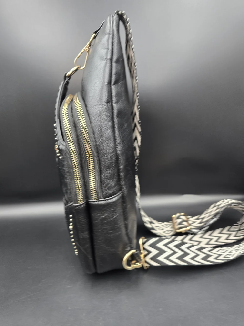 Black Studded Women's Leather Sling Backpack with Patterned Strap